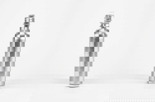 Mr White’s gin adopts recycled aluminium bottles to target sustainable travel retail